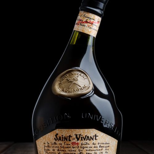 Minsk, Belarus - February 10, 2019:  Armagnac bottle on dark background. Minsk, Belarus.